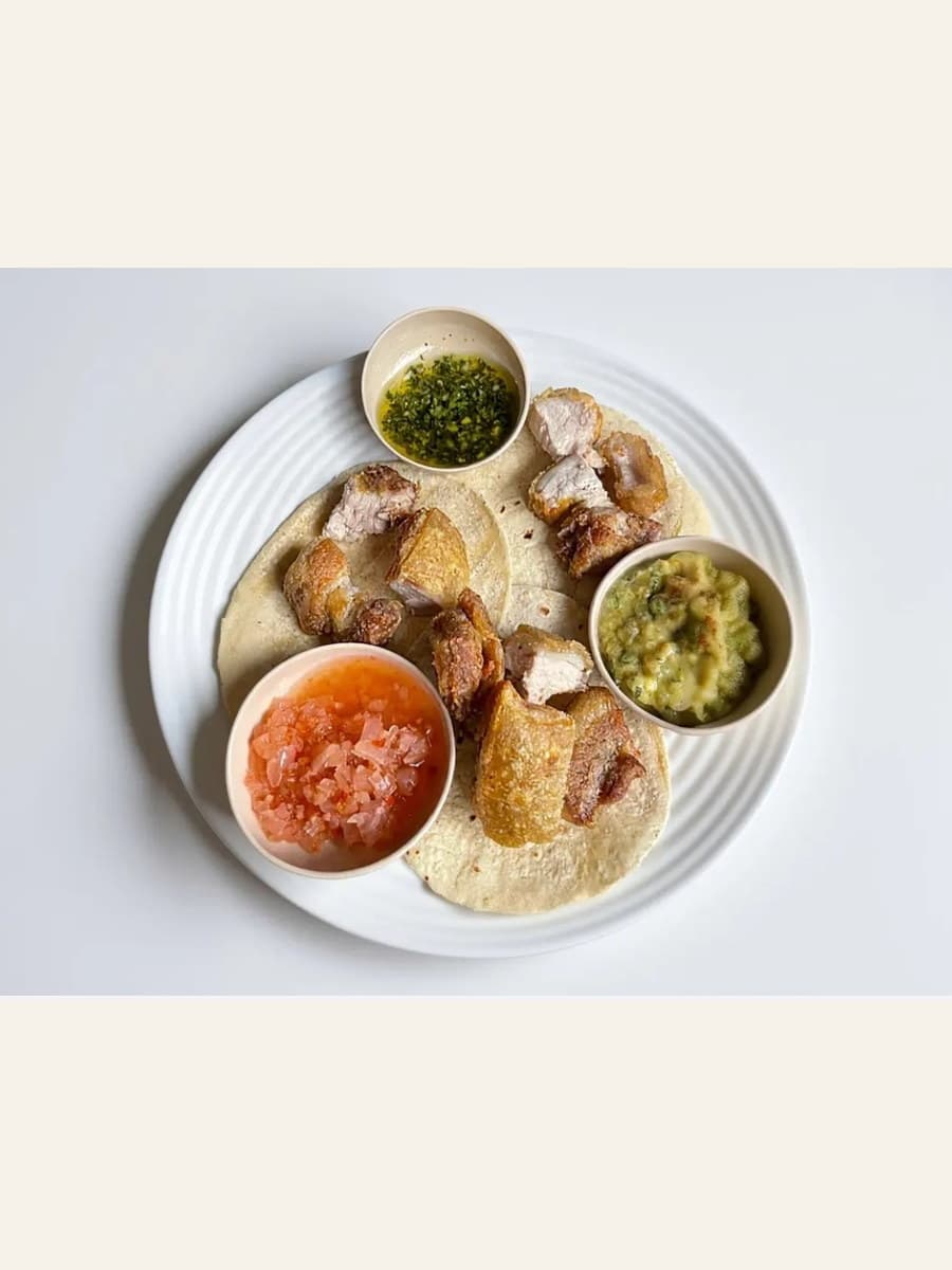 Soft chicharron tacos sold by Santa Perla